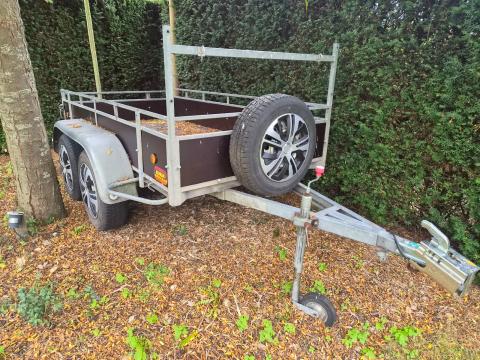 Aanhangwagen dubbelasser